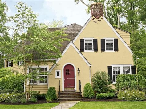 60 style yellow brick houses with metal awning|yellow exterior ideas for homes.